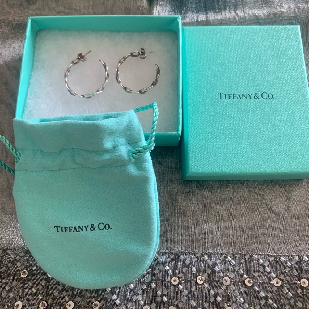 Tiffany and Co. 925 sterling silver Infinity hoop earrings. Never worn.